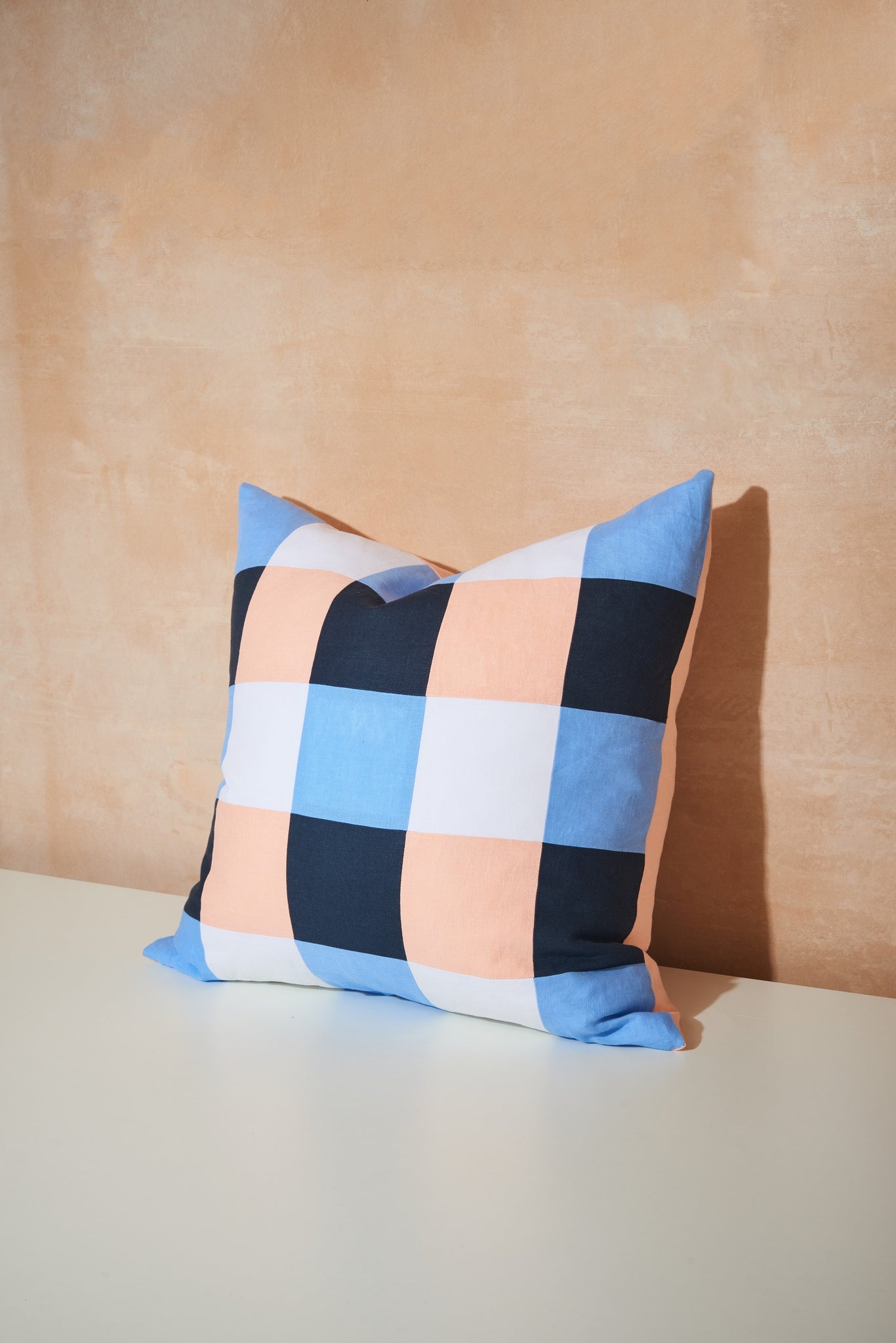 Our cushions are designed and handmade in London with EFOX. Experimenting with combinations of colour and the feelings they evoke evolved to textiles and a series of cushions. Complimentary and contrasting hues and shades beautifully encased within a geometric patchwork. A fun, bold, plump addition to any living or bedroom. 
