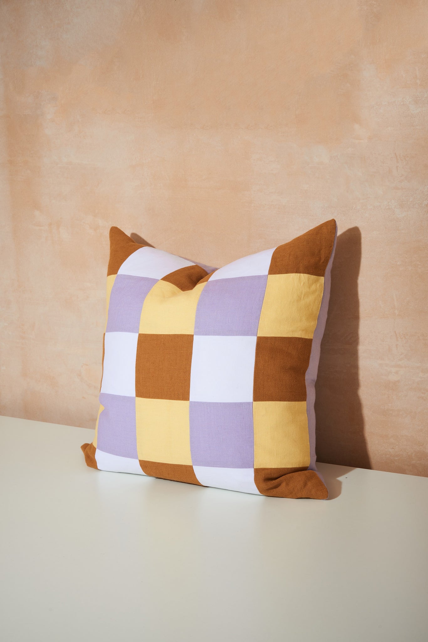 Our cushions are designed and handmade in London with EFOX. Experimenting with combinations of colour and the feelings they evoke evolved to textiles and a series of cushions. Complimentary and contrasting hues and shades beautifully encased within a geometric patchwork. A fun, bold, plump addition to any living or bedroom. 